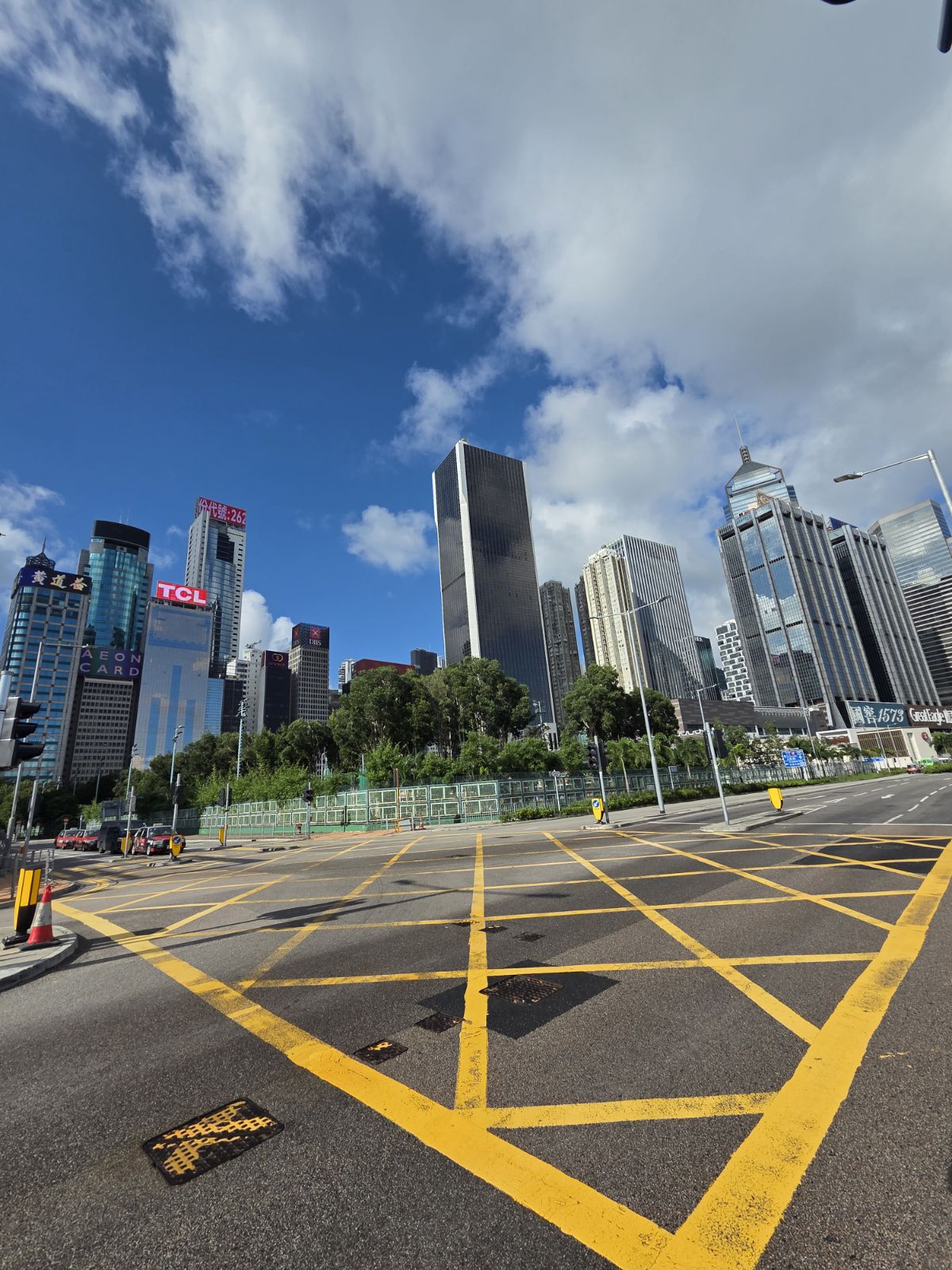 A yellow box junction beneath Wan Chai’s office towers, Hong Kong